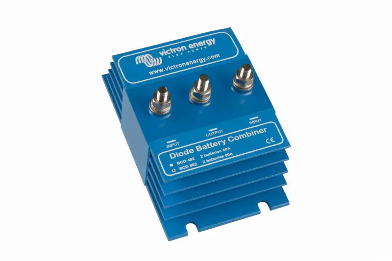 Close-up of blue diode battery combiner transformer on white background for DC power
