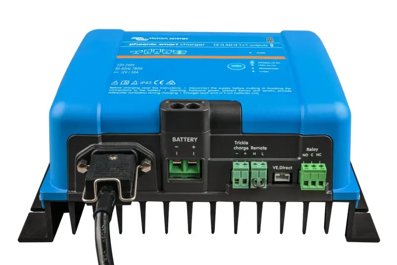 Phoenix Smart IP43 battery charger connected to power strip showcasing its smart features
