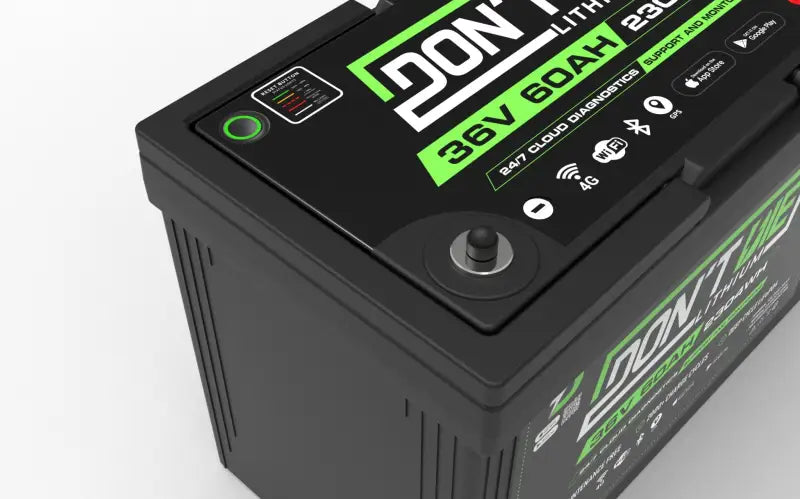 36V 60Ah lithium ion battery close-up with a don’t stop sign.