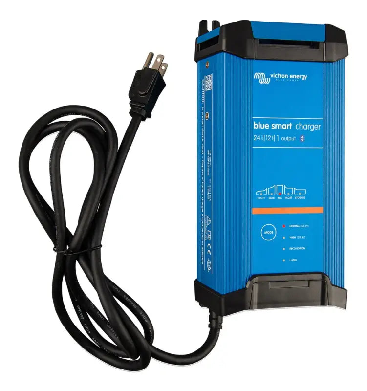 Blue Smart IP22 Charger plugged into power cord, showcasing its efficient design.