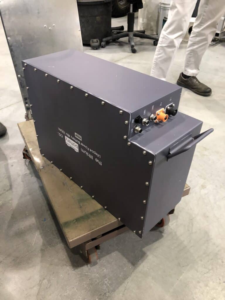 Lithium Battery Company's 48V 100Ah LiFePO4 battery packs integrated into the General Dynamics MUTT, manufactured in Tampa, Florida.